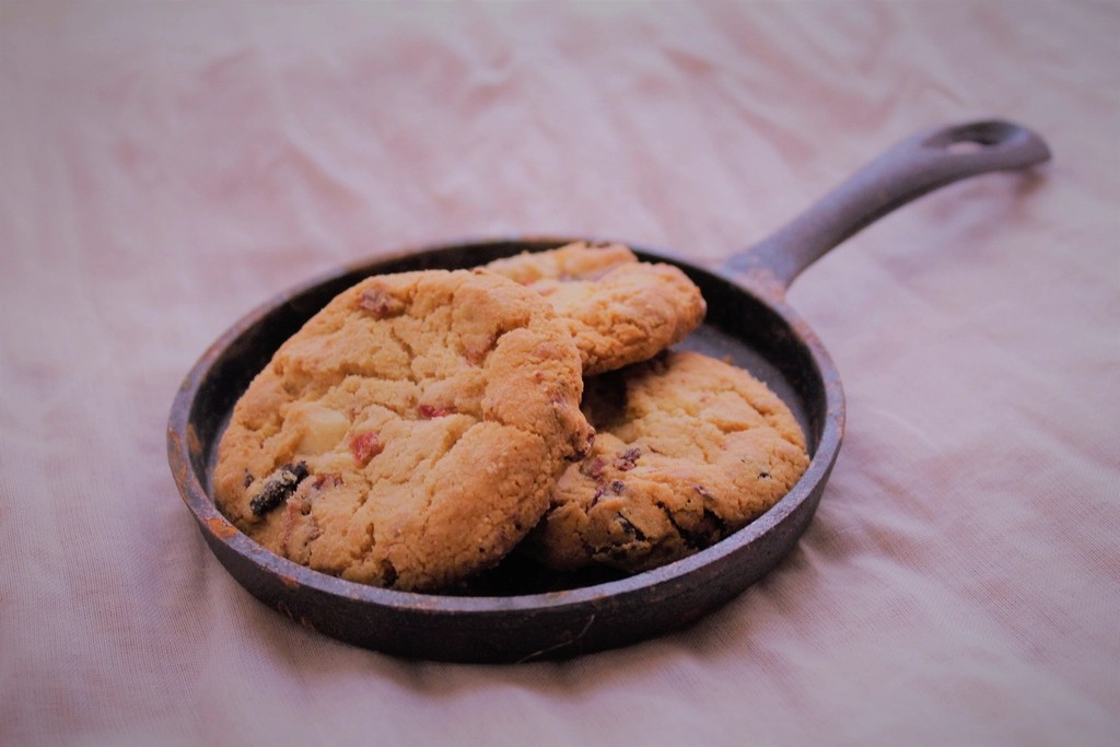 Chocolate chip cookies baked in a small black pan