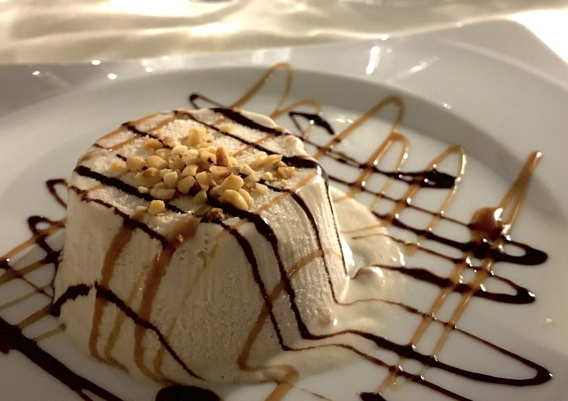 Hazelnut semifreddo slice with chocolate and caramel drizzle