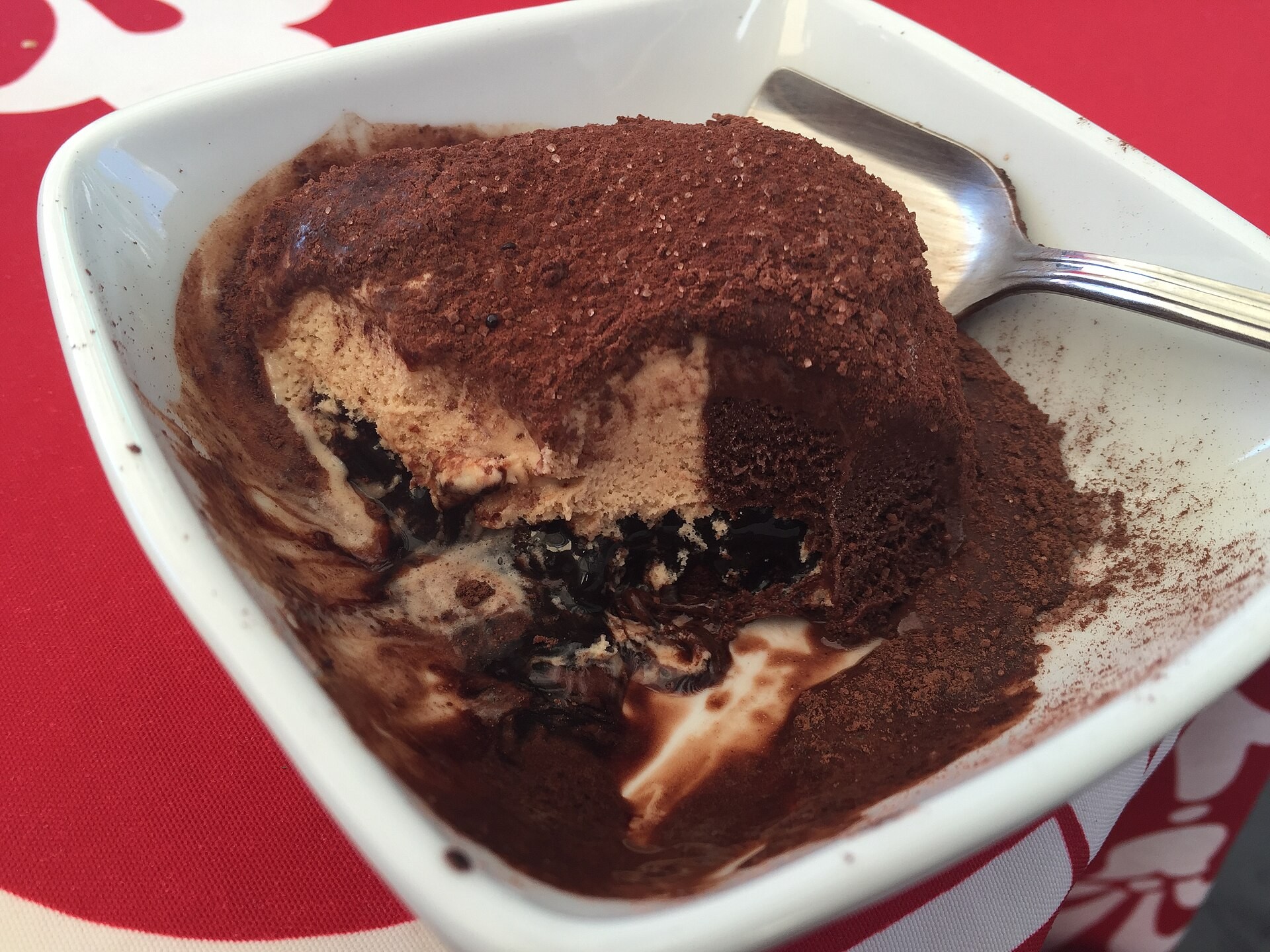 Tartufo dessert cut open showing chocolate and a cherry center