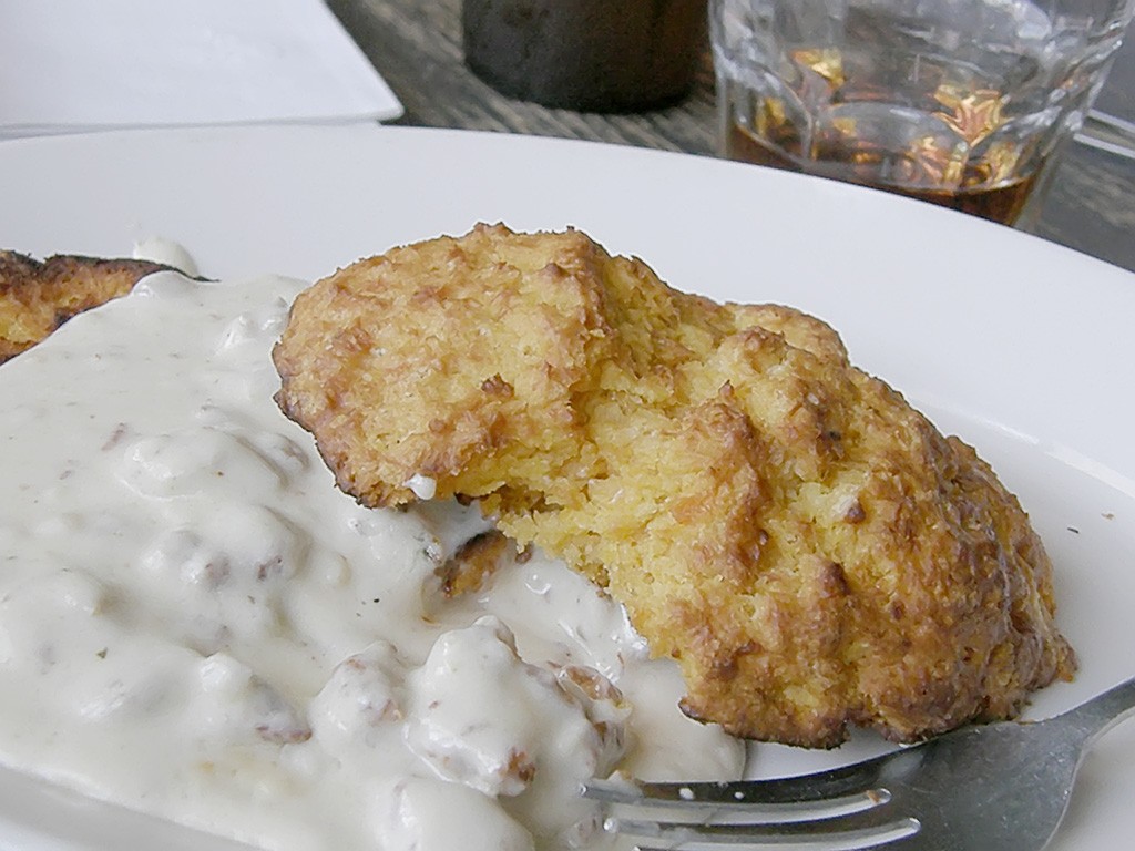 Split biscuits smothered in creamy sawmill gravy